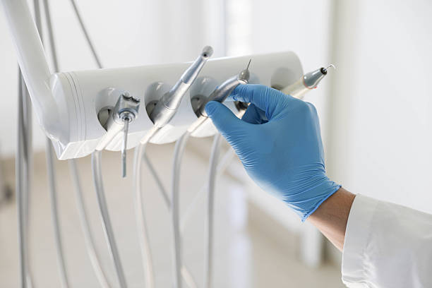 Professional Emergency Dentist technician working in Southport, NC
